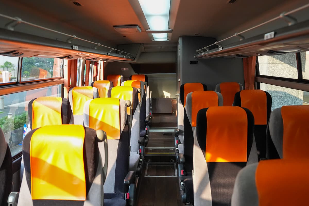 Inside the Narita Airport Limousine Bus with orange seats