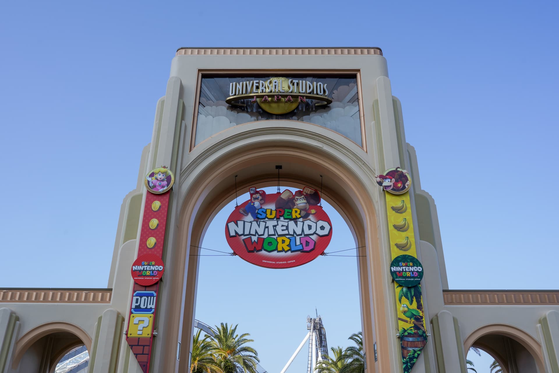 Universal Studios Japan globe entrance with the Super Nintendo World arch underneath