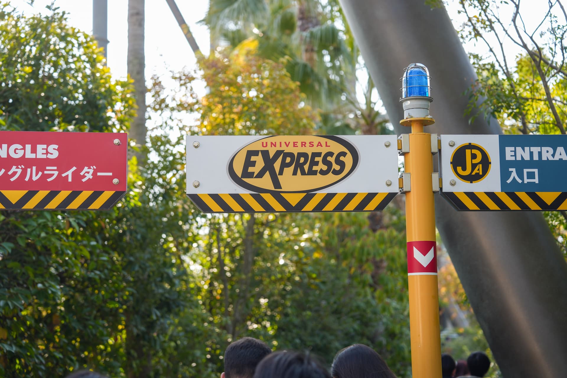 Universal Express and Single Rider signposts inside USJ