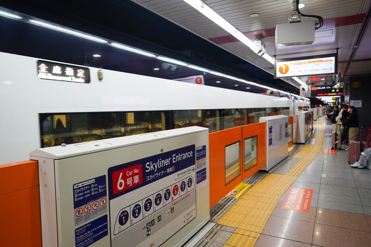 Skyliner platform with car number markings at Narita