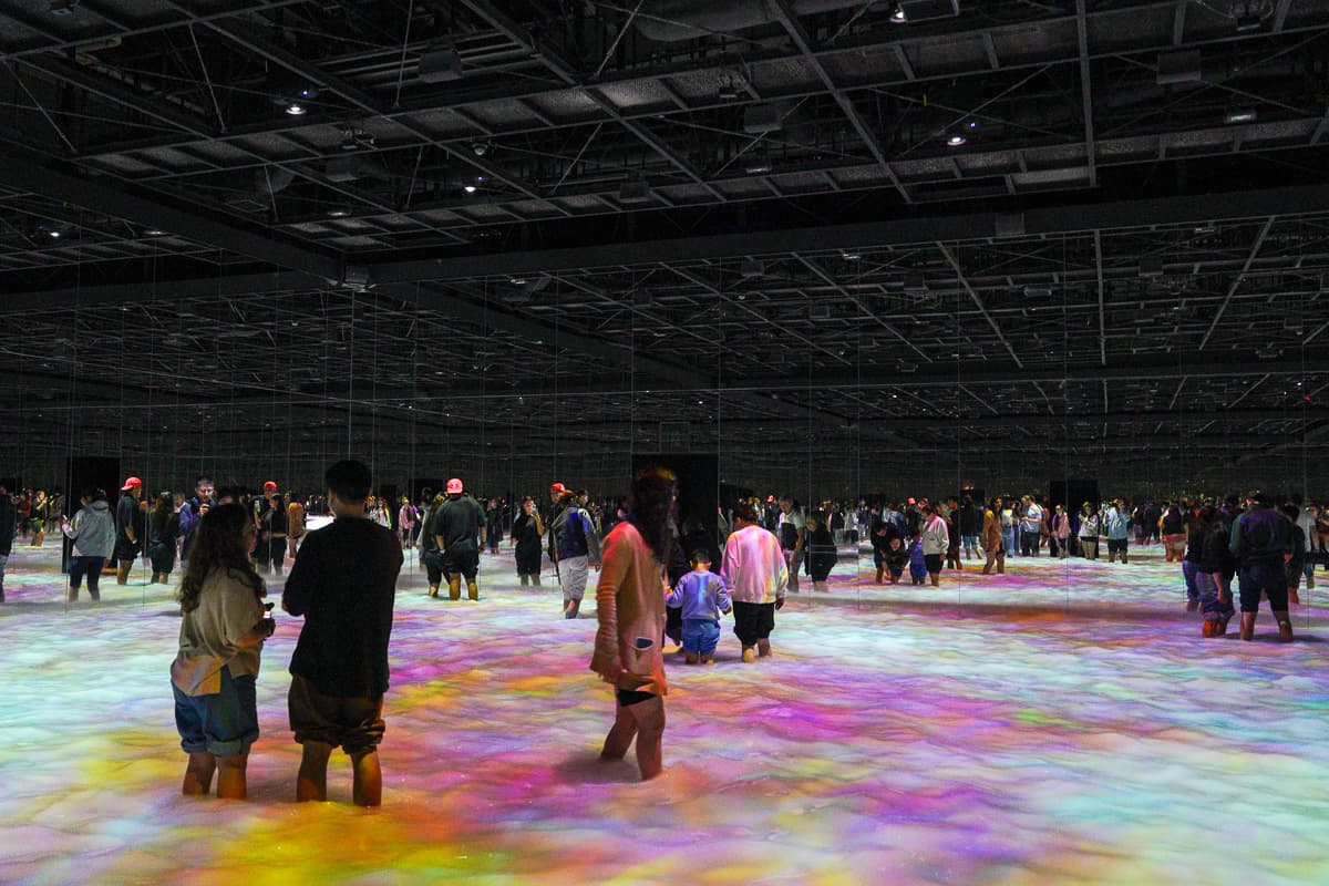 teamLab Planets water exhibition with visitors walking barefoot