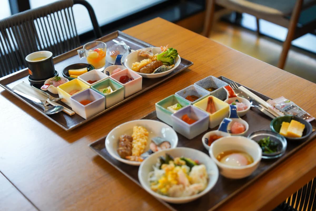 Breakfast trays of small side dishes and seafood at Bespoke Hotel